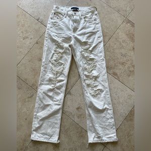 cream color jean pants from Aéropostale. Rips along the front legs, bottom foot